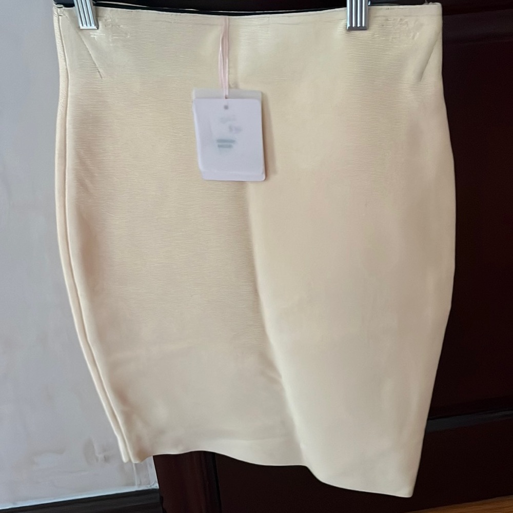 Bandge pencil skirt. Very flattering and sexy.New with tags